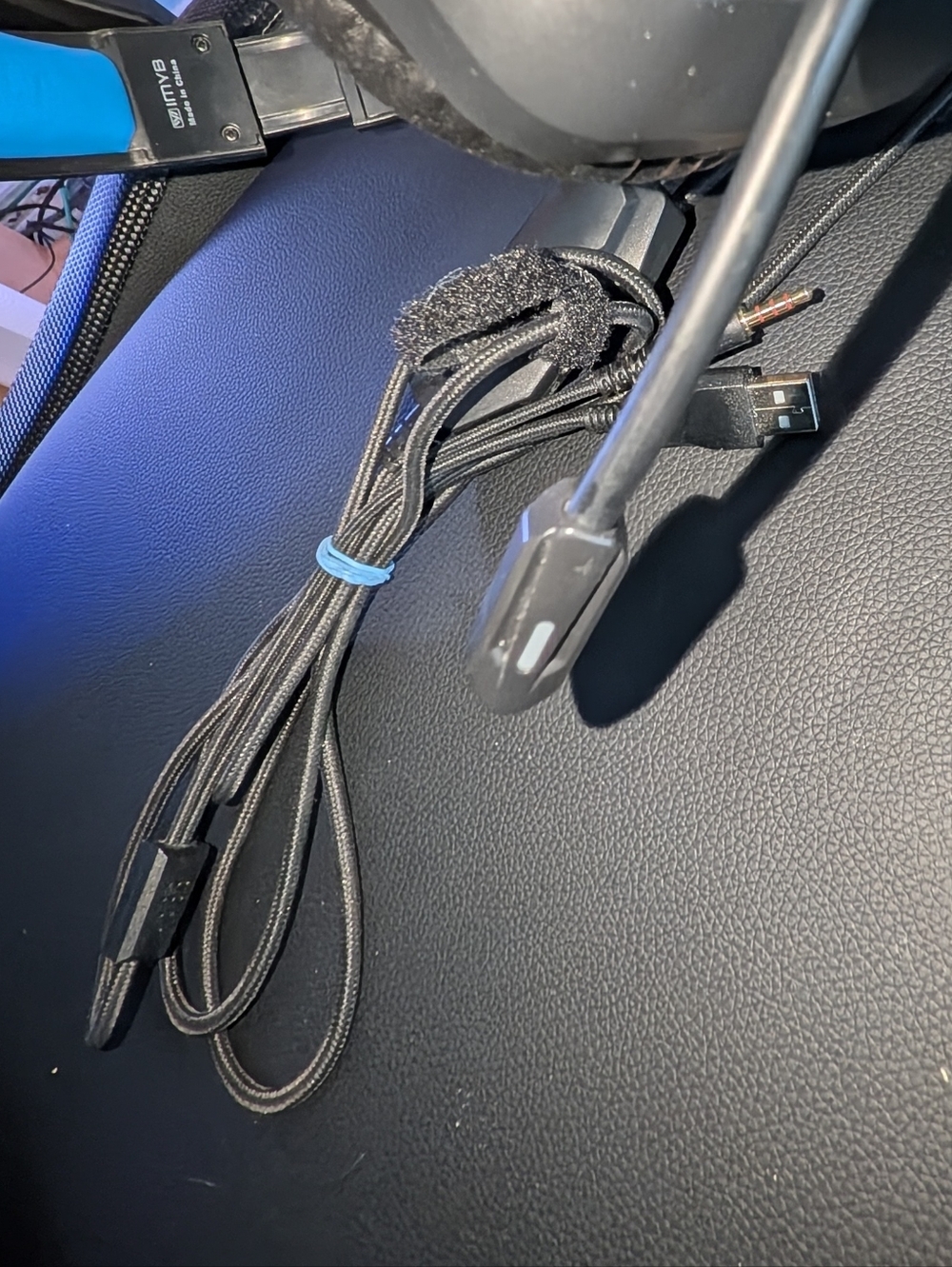 Over-Ear Wired Headphones in Black with Blue Headband Accent - Picture 5 of 6